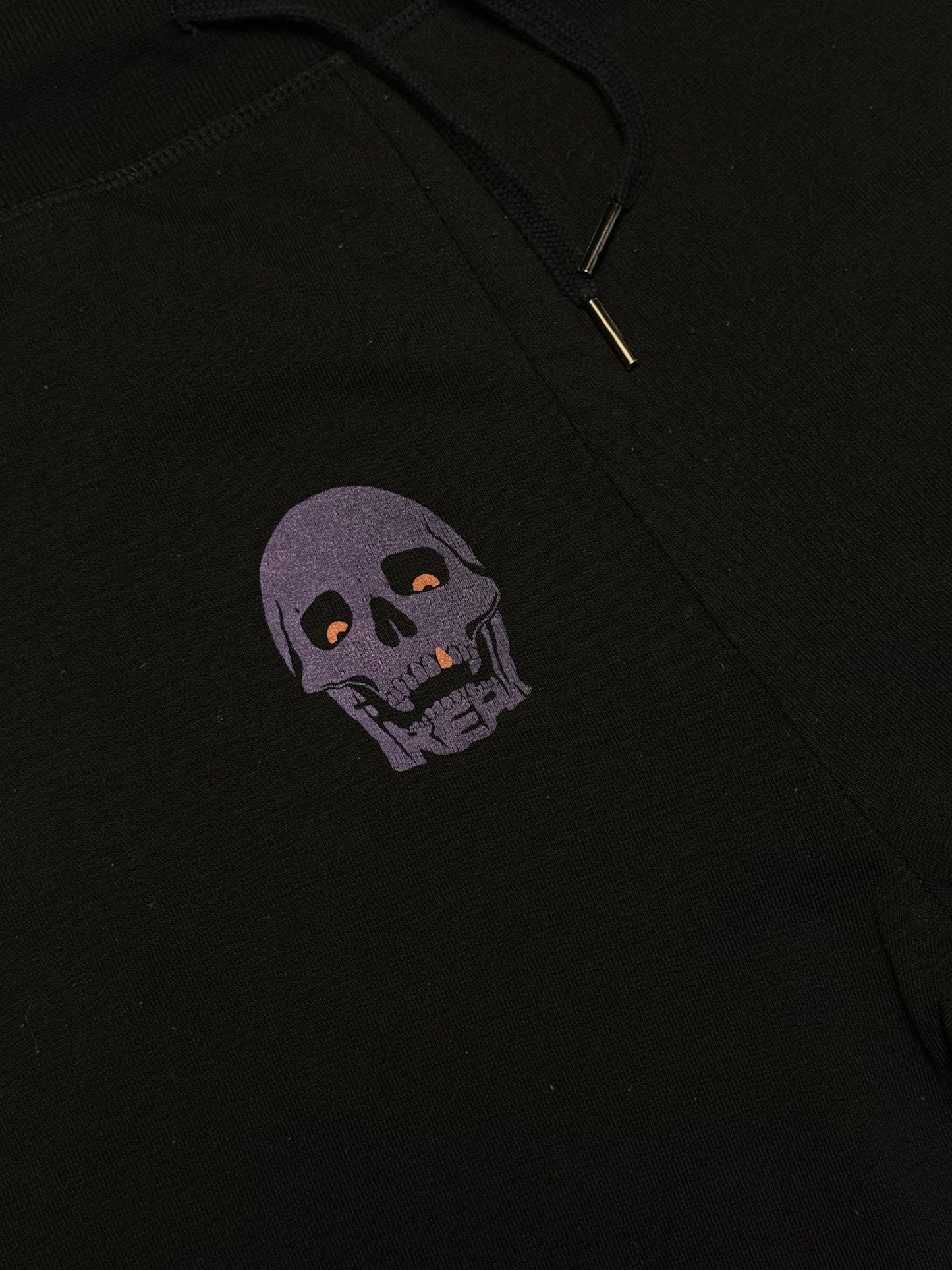 TEPLÁKY FREAK "PURPLE SKULL" (BLACK)